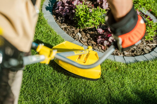edging with a string trimmer edging with a string trimmer